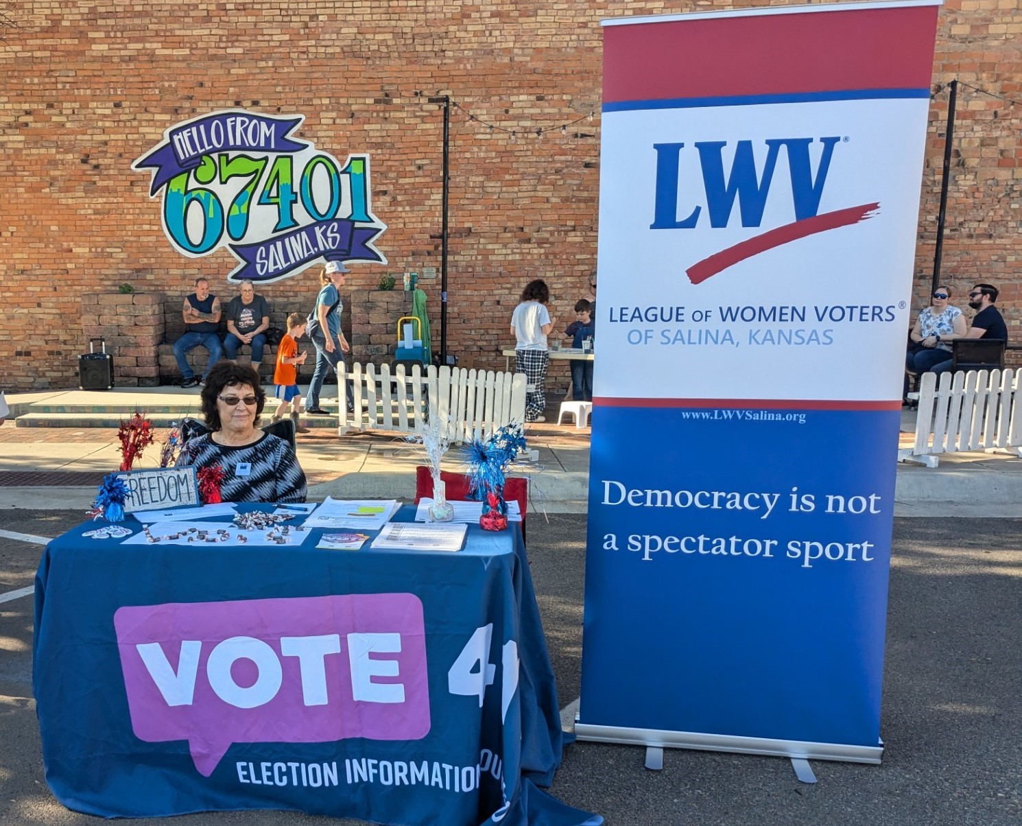 League member at a voter information table