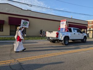 League members and float in a parade